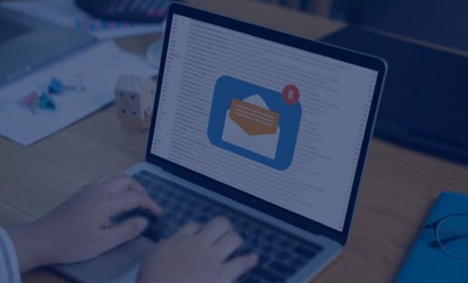 computer with email notification to show the use of email subject lines for surveys