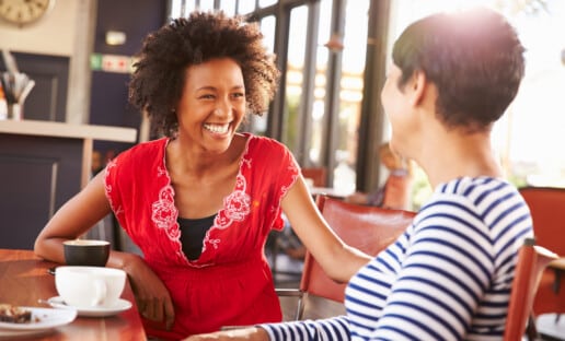 two women demonstrating friendly customer service